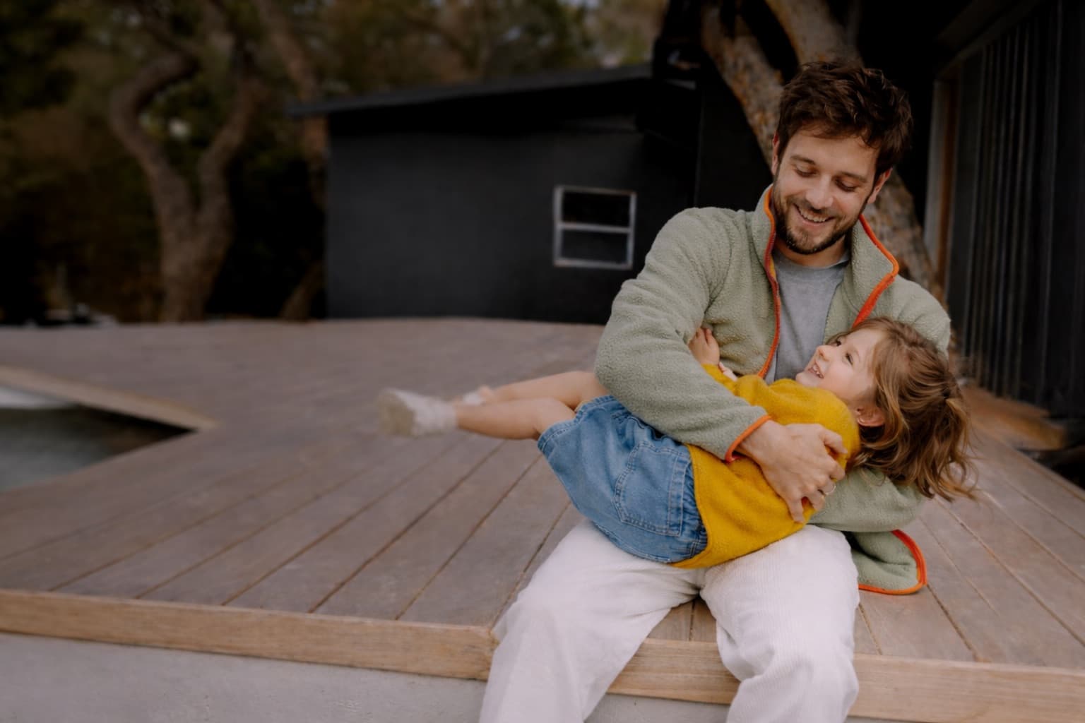 Father playing with daughter