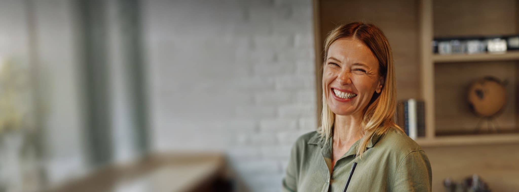 Woman smiling in kitchen